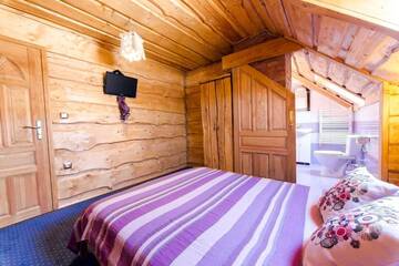 Фото номера Двухместный номер с 1 кроватью Фермерские дома Agroturystyka Paradiso г. Ropa 2