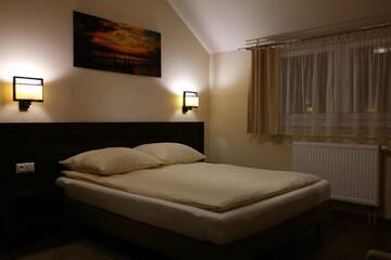 Фото номера Двухместный номер с 1 кроватью Отель Hotel Pod Chełmem г. Ropa 4